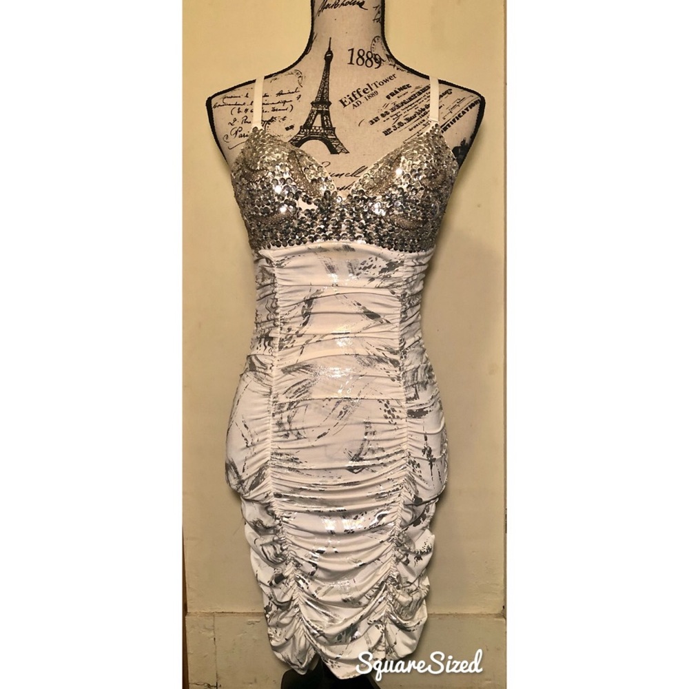 White and silver homecoming dress.